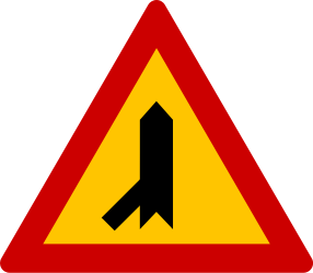 Crossroad with sharp side road on left side