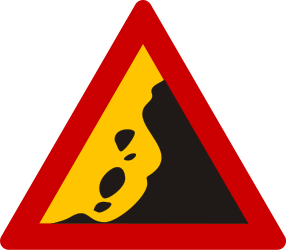 Falling rocks in road - area warning